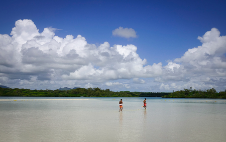 Flacq, Mauritius - Jan 12, 2017. People enjoying on beach at sunny day in Ile aux Cerfs, Mauritius. Mauritius enjoys a tropical climate with clear warm sea waters and beaches.のeditorial素材