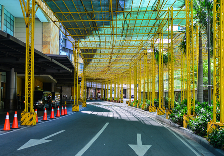 Manila, Philippines - Apr 14, 2017. Street at Global City in Manila, Philippines. Manila is a major center for commerce, banking and finance in Philippines.のeditorial素材