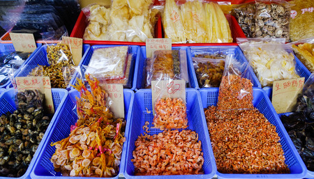 Hong Kong - Apr 1, 2017. Traditional Asian fish market stall, full of dried seafood in Tai O fishing village, Hong Kong.のeditorial素材