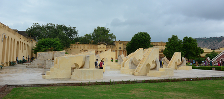 Jaipur, India - Jul 27, 2015. People visit Astronomical Observatory Jantar Mantar at rainy day in Jaipur, India. Jantar Mantar is a collection of 19 instruments, built by the Rajput king Sawai Jai Singh.のeditorial素材