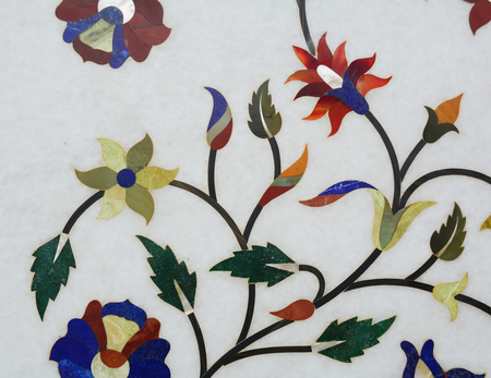 Floral design of precious stones on marble on the walls of Taj Mahal monument, India. Close up.の写真素材