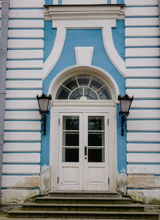 White door at an old palace in Saint Petersburg, Russia.の写真素材