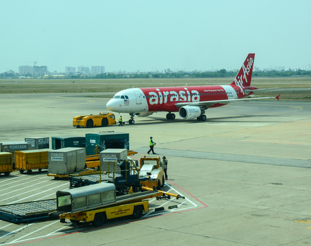 Saigon, Vietnam - Mar 9, 2016. AirAsia aircarft at Tan Son Nhat Intl Airport in Saigon, Vietnam. The...