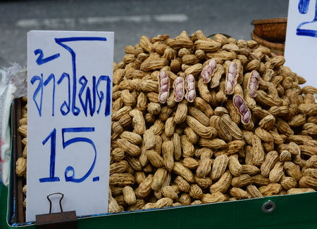 BANGKOK, THAILAND - JUN 15, 2016. Boiled peanut for sale at market on Khao San Road in Bangkok, Thailand. Everyday thousands of tourists and locals buys food on these stalls.のeditorial素材