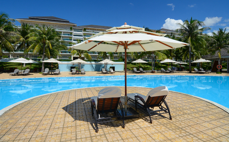 Phan Thiet, Vietnam - Oct 14, 2015. Swimming pool at luxury resort in Phan Thiet, Vietnam. Phan Thiet is a coastal city famous for many luxury resorts runing along the coast.のeditorial素材