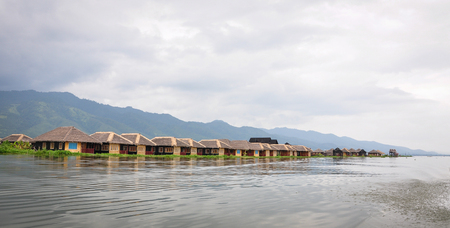 Wooden cottages on Inle Lake in Shan state, Myanmar. Inle Lake is a major tourist attraction, and this has led to some development of tourist infrastructure.のeditorial素材