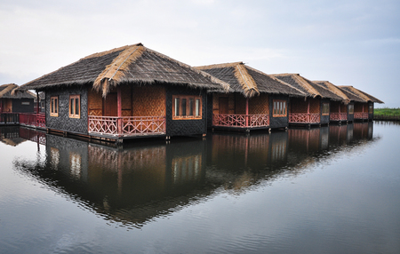 Wooden houses on Inle lake in Shan state, Myanmar. The Inle Lake is famous for its floating villages and the unique way of life of Intha people.のeditorial素材
