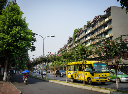 Chengdu, China - Aug 20, 2016. Buses on street at downtown in Chengdu, China. Chengdu is one of the three most populous cities in Western China (the other two are Chongqing and Xian).のeditorial素材