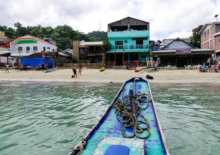 El Nido, Philippines - Apr 7, 2017. View of the beach with many guesthouses in El Nido, Philippines. El Nido is a coastal settlement and major tourist destination in Philippines.のeditorial素材