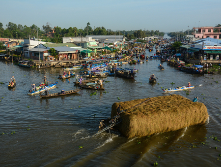 Soc Trang, Vietnam - Feb 2, 2016. Wooden boats at Nga Nam Floating Market in Soc Trang, Vietnam. Floating markets can be described as a marketplace where goods are sold on boats.のeditorial素材