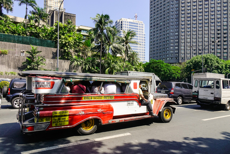 Manila, Philippines - Apr 12, 2017. Jeepney on street in Makati, Manila, Philippines. The city of Makati remains the richest local government unit (LGU) in the Philippines.のeditorial素材
