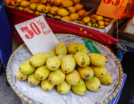 Manila, Philippines - Apr 12, 2017. Selling yellow mangoes at market in Manila, Philippines. Manila is the center of culture, economy, education and government of the Philippines.のeditorial素材