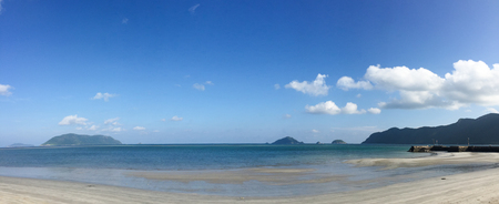 Seascape of Con Dao Island in southern Vietnam. Panorama view of sand beach at sunny day.の写真素材