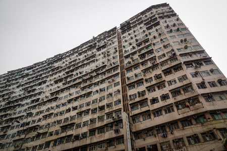 Hong Kong - Mar 29, 2017. An old apartment located at Kowloon District in Hong Kong. Hong Kong is an important hub in East Asia with global connections to many of the world cities.のeditorial素材