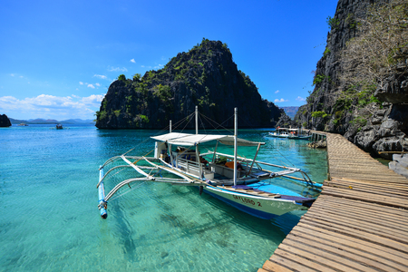 Palawan, Philippines - Apr 11, 2017. Wooden boats docking at tourist jetty in Palawan, Philippines. Palawan is named as the best island in the world by numerous travel magazines.のeditorial素材
