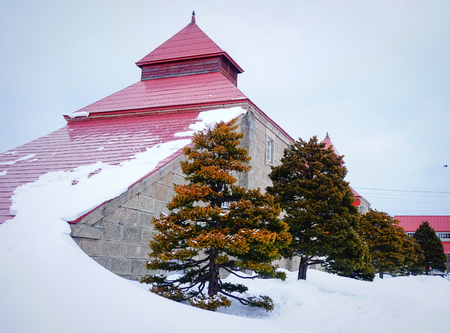 Old castle with red roof top at the rainy day in winter.のeditorial素材