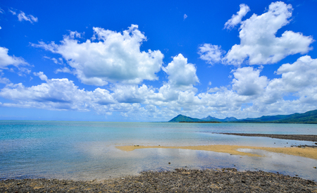Tropical sea under blue sky in Le Morne, Mauritius. Mauritius was uninhabited until 1598, and had much unique wildlife and plant life.の写真素材