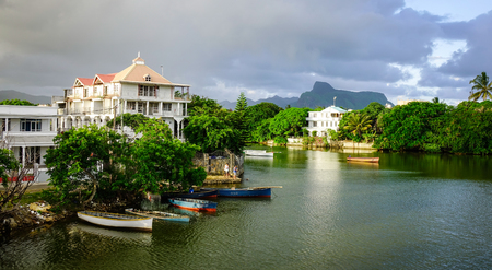 Mahebourg, Mauritius - Jan 5, 2017. River scene with wooden boats in Mahebourg, Mauritius. Mahebourg is a small city on the south-eastern coast of Mauritius.のeditorial素材