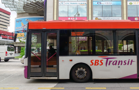 Singapore - Dec 14, 2015. A SBS bus runs on street in Chinatown, Singapore. Singapore is a sovereign city-state in Southeast Asia, and the world only island city-state.のeditorial素材
