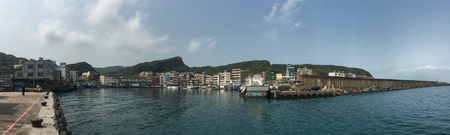 Keelung, Taiwan - Mar 19, 2015. Panorama view of fishing port at sunny day in Keelung, Taiwan. Keelung is a major port city situated in the northeastern part of Taiwan.のeditorial素材