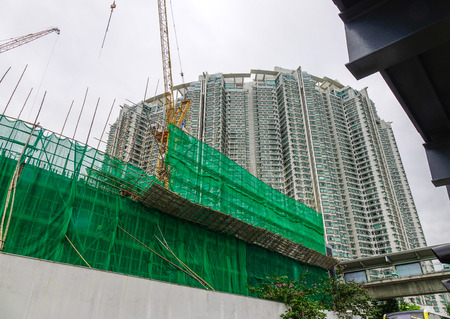 Hong Kong - Mar 31, 2017. Construction site at Tung Chung in Hong Kong. Hong Kong is a major tourism destination for China increasingly affluent mainland population.のeditorial素材
