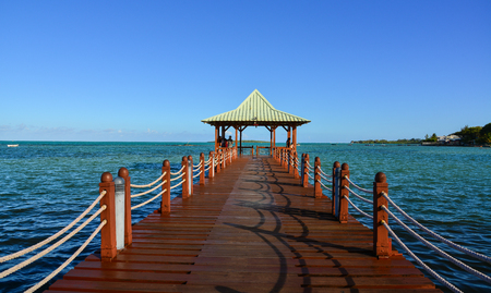 Mahebourg, Mauritius - Jan 3, 2017. View of a wooden bridge in Mahebourg, Mauritius. Mauritius, an Indian Ocean island nation, is known for its beaches, lagoons and reefs.のeditorial素材
