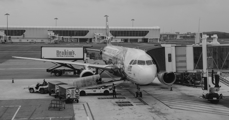 Kuala Lumpur, Malaysia - Apr 13, 2016. Civil airplane docking at KLIA2 Airport in Kuala Lumpur, Malaysia. KLIA2 is the world largest purpose-built terminal dedicated for budget airlines.のeditorial素材