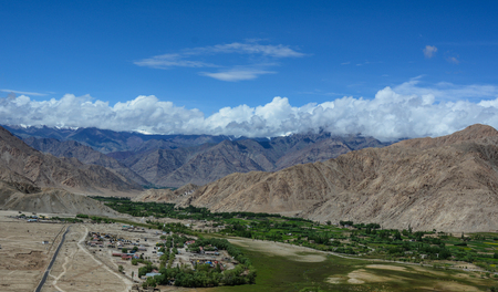 Mountain scenery with green valley at sunny day in Ladakh, India. Ladakh is the highest plateau in the state of Jammu & Kashmir with much of it being over 3,000m.の写真素材