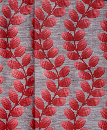 Sunrise through colorful curtains of a window in the morningの写真素材