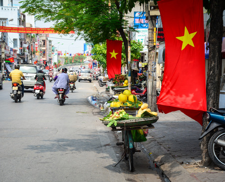 Hai Phong, Vietnam - May 21, 2016. Traffic on street at downtown in Hai Phong, Vietnam. Hai Phong is a major port city in northeastern Vietnam, across from Cat Ba Island.のeditorial素材