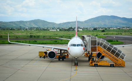 Dalat, Vietnam - May 20, 2016. An airplane docking at the Lien Khuong Airport in Dalat, Vietnam. Dalat is located 1,500 m (4,900 ft) above sea level on the Langbian Plateau.のeditorial素材
