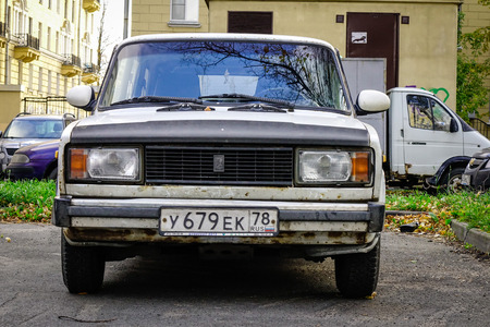 St. Petersburg, Russia - Oct 8, 2016. An old rusty car parking on street at downtown in St. Petersburg, Russia. Saint Petersburg has a significant historical and cultural heritage.のeditorial素材