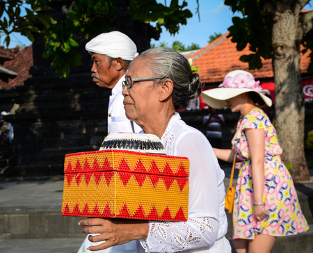 Bali, Indonesia - Apr 21, 2016. People coming to Elephant Cave Temple in Bali, Indonesia. Goa Gajah (Elephant Cave) is a Hindu temple located very close to Ubud in the hills of Bali.のeditorial素材
