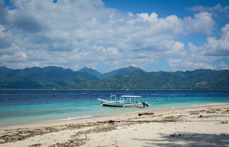 Lombok, Indonesia - Apr 18, 2016. A boat on Gili Islands in Indonesia. Gili Islands are an archipelago of three small islands just off the northwest coast of Lombok, Indonesia.のeditorial素材