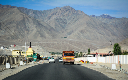 Ladakh, India - Jul 16, 2015.  Traffic on mountain road in Ladakh, India. Ladakh is the highest plateau in the state of Jammu & Kashmir with much of it being over 3,000m.のeditorial素材