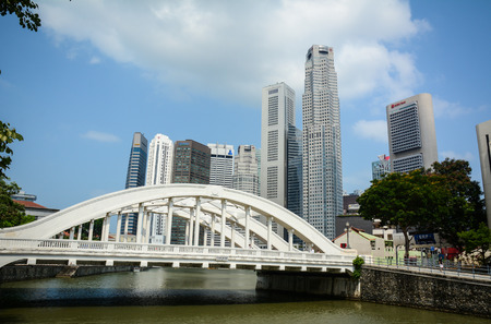 Singapore - Jul 3, 2015. Elgin Bridge with modern buildings at downtown in Singapore. Singapore is global financial center with a tropical climate and multicultural population.のeditorial素材