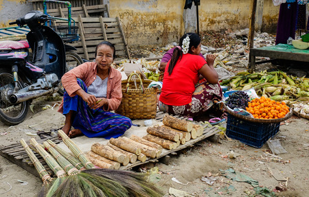 Mandalay, Myanmar - Feb 23, 2016. Burmese women at local market in Mandalay, Myanmar. Mandalay is the second largest city in Burma, and a former capital of Myanmar.のeditorial素材