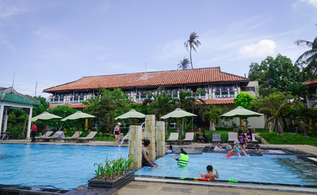 Phan Thiet, Vietnam - Mar 26, 2017. People enjoy at swimming pool in Phan Thiet, Vietnam. Phan Thiet belongs to Binh Thuan province and located 200km South of Cam Ranh Bay.のeditorial素材