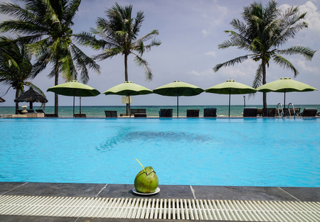 Phan Thiet, Vietnam - Mar 26, 2017. Swimming pool with a coconut fruit in Phan Thiet, Vietnam. Phan Thiet belongs to Binh Thuan province and located 200km South of Cam Ranh Bay.のeditorial素材