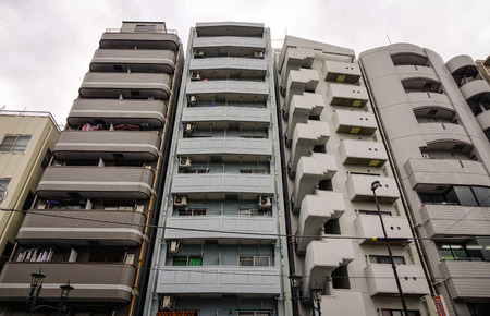 Tokyo, Japan - Dec 7, 2016. Modern buildings at business district in Tokyo, Japan. Tokyo urban area 38 million people had a total GDP of 2 trillion USD in 2012.のeditorial素材