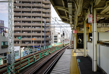 Tokyo, Japan - Dec 7, 2016. Platform of a JR station at downtown in Tokyo, Japan. Railways are the most important means of passenger transportation in Japan.のeditorial素材