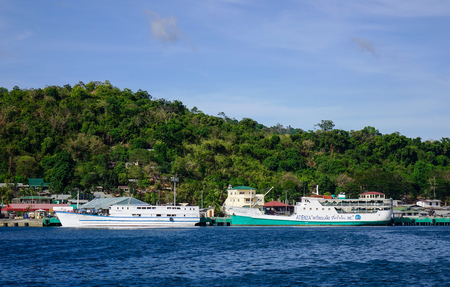 Coron, Philippines - Apr 8, 2017. Many ships dock at jetty in Coron Island, Philippines. Coron is the third-largest island in the Calamian Islands in northern Palawan.のeditorial素材