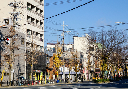 Kyoto, Japan - Dec 26, 2015. Vehicles running on street at downtown in Kyoto, Japan. Kyoto is also known as the thousand-year capital.のeditorial素材