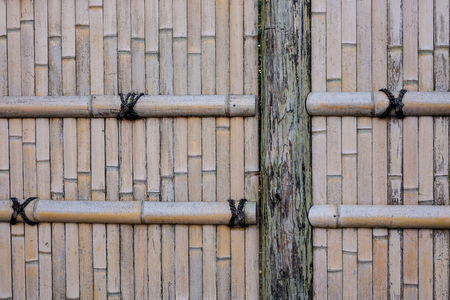 Bamboo fence at an ancient temple in Kyoto, Japan. Close up.の写真素材