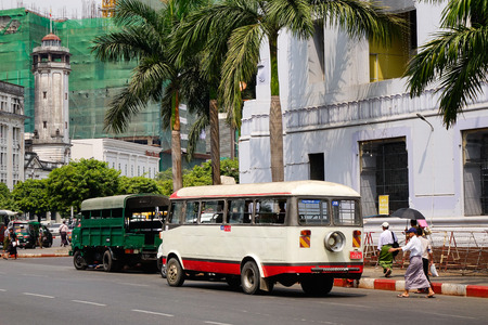 Yangon, Myanmar - Feb 26, 2016. Many cars run on main street at rush hour in Yangon, Myanmar. Yangon is the country main centre for trade, industry and tourism.のeditorial素材