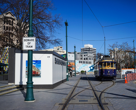 Christchurch, New Zealand - May 2, 2015. Vintage style tram on the Tramway at sunny day in Christchurch, New Zealand. Christchurch is the 3rd largest city in New Zealand with a population over 350,000.のeditorial素材