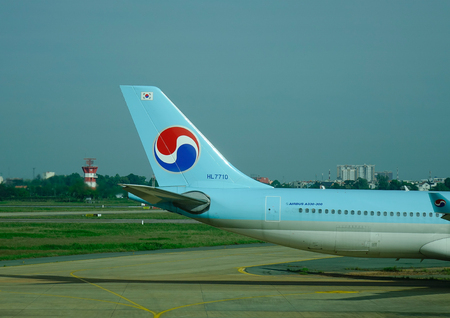 Saigon, Vietnam - Jan 2, 2017. Korean airplane docks at Tan Son Nhat Airport in Saigon (Ho Chi Minh...