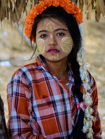Mandalay, Myanmar - Feb 22, 2016. Portrait of Burmese girl at countryside in Mandalay, Myanmar. Mandalay is the second-largest city and the last royal capital of Myanmar (Burma).のeditorial素材