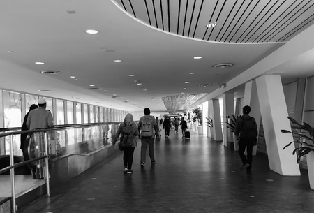 Saigon, Vietnam - Apr 13, 2016. Passengers walking at Tan Son Nhat International Airport in Saigon, Vietnam. Tan Son Nhat is the busiest airport in Vietnam with 32.5 million passengers in 2016.のeditorial素材