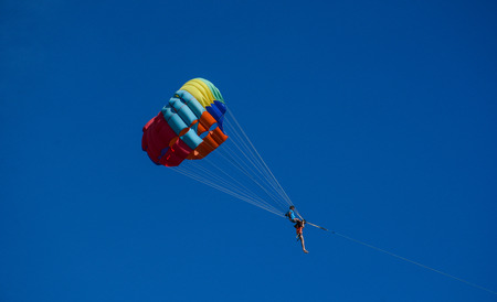 Phuket, Thailand - Jun 19, 2016. People playing parasailing in Phuket, Thailand. Phuket is a heady mix of bustling bars, night spots, restaurants and truly spectacular dive locations.のeditorial素材